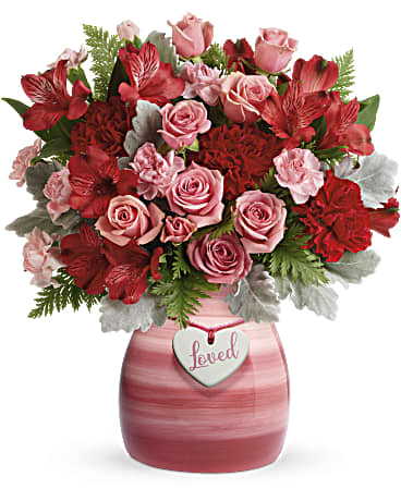 Deluxe size, 13 inches height and 11 and a half inches wide.