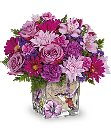 Deluxe size, 12 and a half inches height and 13 inches wide.