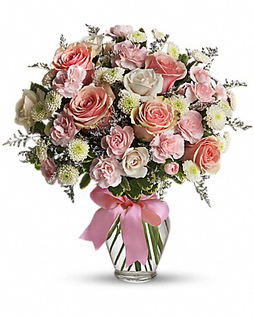 Deluxe size, 14 and a half inches height and 14 inches wide.